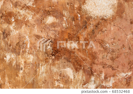 Clay soil background, orange soil, closeup, texture Clay soil background, orange soil, closeup, texture 68532468