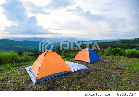 tent camping on the mountains landscape background 68532727