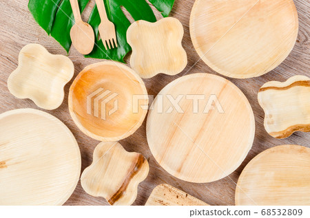 Kitchenware made from dried betel nut leaf palm. 68532809
