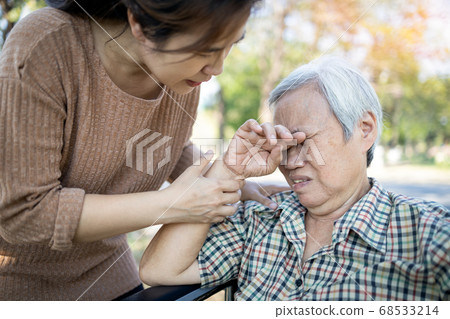 Asian old people is crying,elderly woman with depression is bored of herself,feels herself worthless,patient have idea of wanting to die,female caregiver or daughter is help,care senior mother closely Asian old people is crying,elderly woman with depression is bored of herself,feels herself worthless,patient have idea of wanting to die,female caregiver or daughter is help,care senior mother closely 68533214