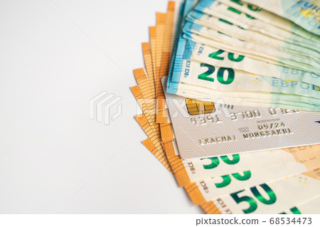 Euro bill money note pile bundle on white Euro bill money note pile bundle on white 68534473