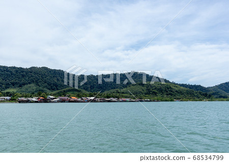 Typical sea with blue cloudy sky in normal day. Typical sea with blue cloudy sky in normal day. 68534799