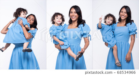 Asian Mother Caucasian Daughter Little girl hold 68534966