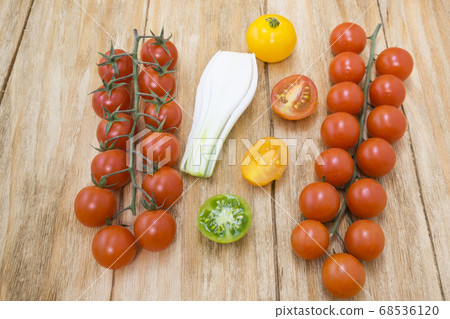 red tomatoes, yellow and scallions red tomatoes, yellow and scallions 68536120