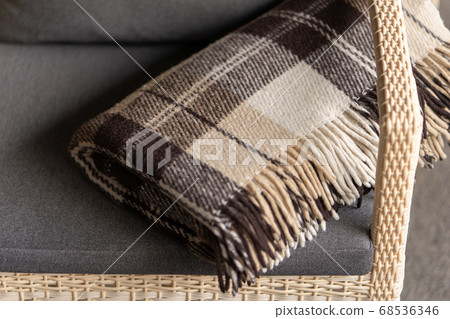 The texture of the fabric of a warm woolen brown The texture of the fabric of a warm woolen brown 68536346