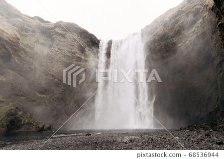 Skogafoss waterfall in the south of Iceland, on the golden ring. Skogafoss waterfall in the south of Iceland, on the golden ring. 68536944