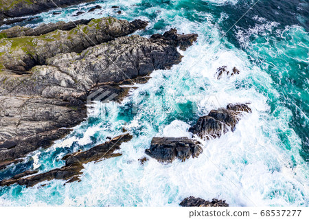 Aerial view of the coastline at Malin Head in Ireland Aerial view of the coastline at Malin Head in Ireland 68537277