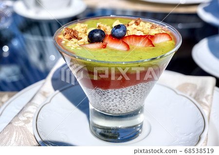 Chia pouding with fruits on a glass on a 68538519
