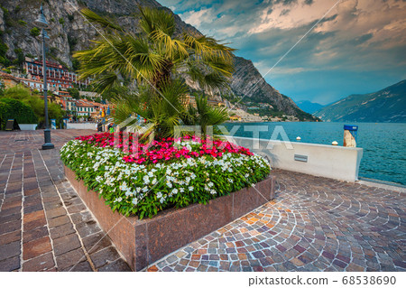 Stunning promenade with colorful flowers, Limone sul Garda, Lombardy, Italy 68538690