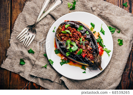Eggplant stuffed with ground beef and tomatoes Eggplant stuffed with ground beef and tomatoes 68539265