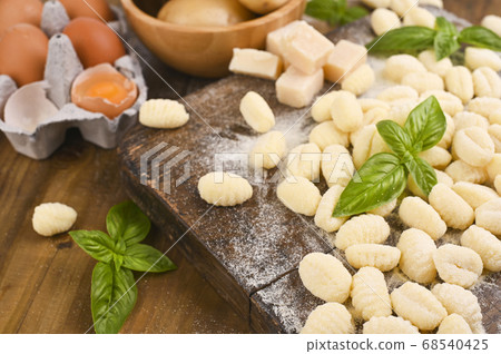 Gnocchi with potatoes. Traditional italian food from Rome, Sardinia, south of italy. Homemade Gnocchi with potatoes. Traditional italian food from Rome, Sardinia, south of italy. Homemade 68540425
