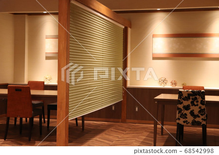 Partition that divides the interior of a fashionable restaurant Partition that divides the interior of a fashionable restaurant 68542998