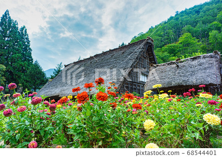 Building with flowers and gassho Building with flowers and gassho 68544401