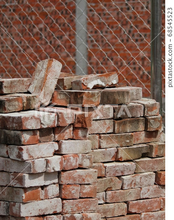 COLOR PHOTO OF PILE OF RED CLAY BRICKS IN CONSTRUCTION SITE COLOR PHOTO OF PILE OF RED CLAY BRICKS IN CONSTRUCTION SITE 68545523