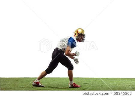 American football player in action isolated on white studio background American football player in action isolated on white studio background 68545863
