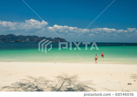 old couple enjoy turquoise sea at Poda island old couple enjoy turquoise sea at Poda island 68546036
