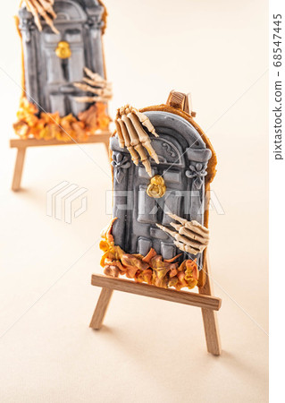 Halloween homemade gingerbread cookies over wooden table. Halloween holiday. Autumn concept. Halloween homemade gingerbread cookies over wooden table. Halloween holiday. Autumn concept. 68547445