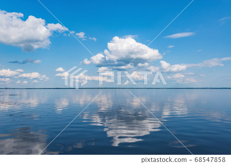 View of the lake at windless weather time View of the lake at windless weather time 68547858