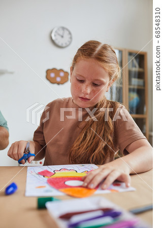 Red Haired Girl in Art and Craft Lesson 68548310