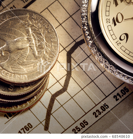 coin and clock on chart 68548610