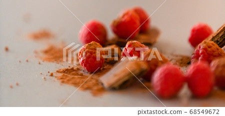 raspberries with chocolate on gray background chocolate raspberries with chocolate on gray background chocolate 68549672