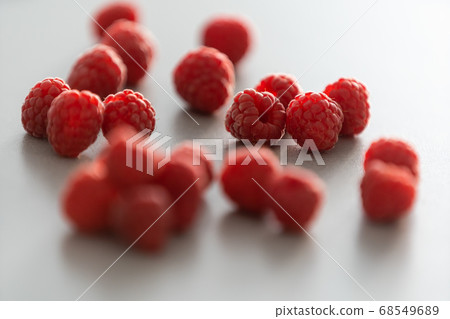 red Raspberry fruit on gray background chocolate 68549689