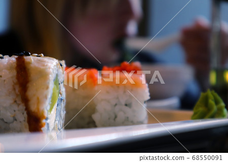 Japanese food in a cafe. Sushi close-up 68550091