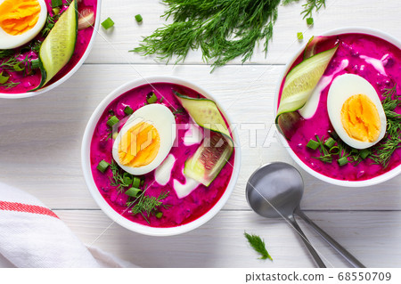 Soup from fresh young beetroot and cucumbers 68550709