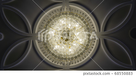 Crystal ball chandelier decorated on a ceiling Crystal ball chandelier decorated on a ceiling 68550883