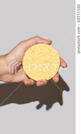 Remove makeup pad. Yellow cosmetology skin care routine 68551588