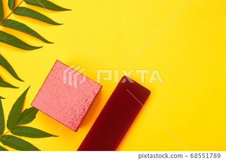 minimalism red gifts on a yellow background minimalism red gifts on a yellow background 68551789