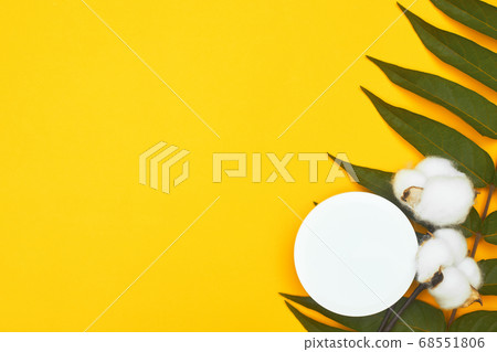 white cosmetic jar with cotton buds on a yellow background, copy space, flatley, MOCKUP white cosmetic jar with cotton buds on a yellow background, copy space, flatley, MOCKUP 68551806