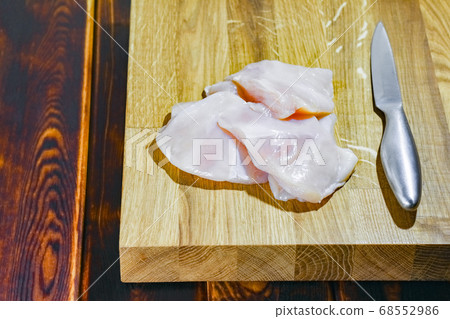 chicken fillet on a cutting Board top view chicken fillet on a cutting Board top view 68552986