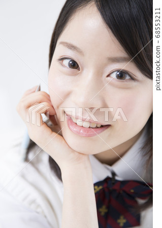 Smiling girls high school students 68553211