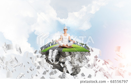 Young woman keeping mind conscious. Young woman keeping mind conscious. 68556797