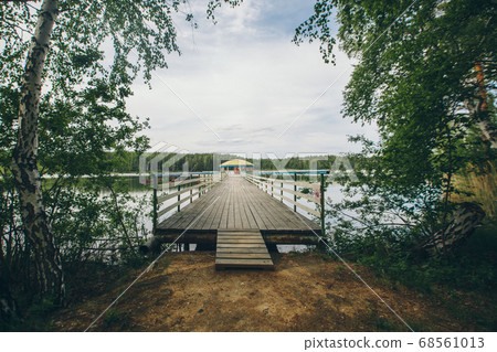 fishing bridge by the river. boat landing on the lake. water and transport 68561013