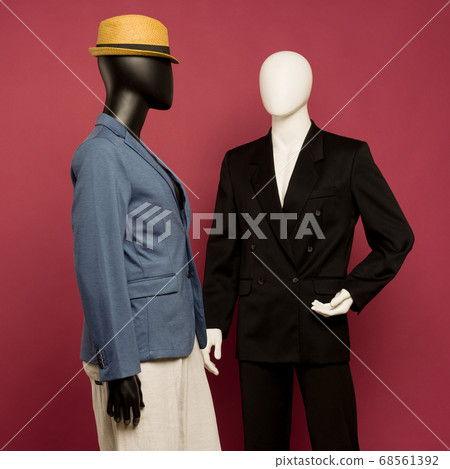 Two male mannequin in a black business suit and in 68561392