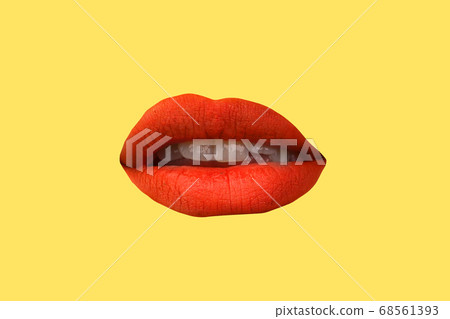 Woman's lips close up isolated on yellow 68561393