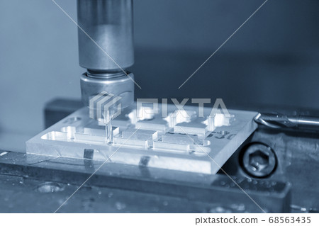 The  CNC  milling machine cutting  the mold parts. 68563435