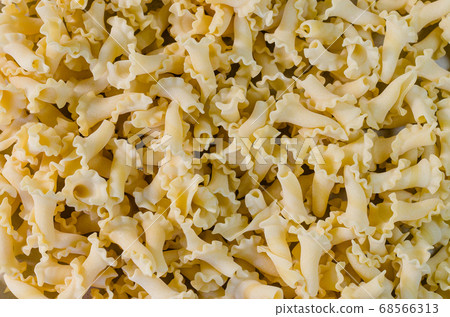 Gigli Pasta in Close Up Detail for Food Background. Gigli Pasta in Close Up Detail for Food Background. 68566313