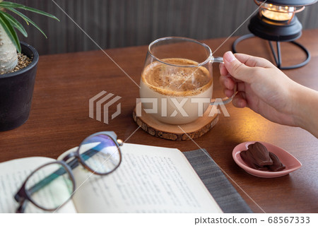 Man with autumn reading and coffee Dargona 68567333