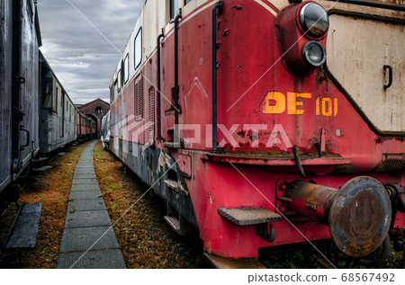 Old station and rusty train 68567492