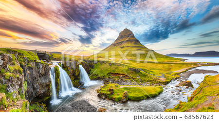 Dramatic view on Kirkjufellsfoss waterfall  near 68567623