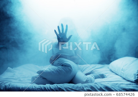 Psycho woman show hand in bed, psychedelic person Psycho woman show hand in bed, psychedelic person 68574426