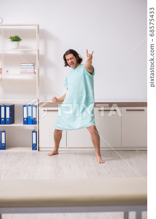 Young mad man in the hospital Young mad man in the hospital 68575433