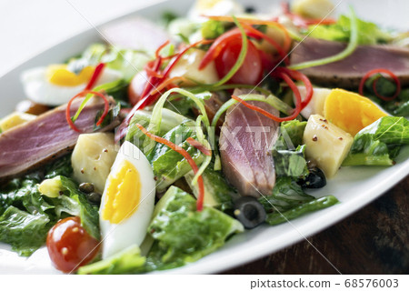 fresh seared raw tuna mixed vegetable salad  with 68576003