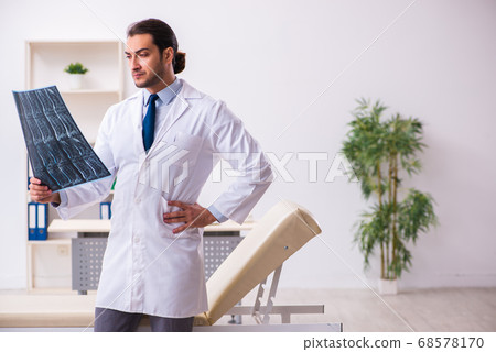 Young male doctor radiologist working in the clinic Young male doctor radiologist working in the clinic 68578170