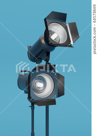 Photo studio lighting stands with flash and softbox on the blue background 68578609