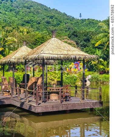 Gazebo on the lake in the Yanoda Rainforest Gazebo on the lake in the Yanoda Rainforest 68578692