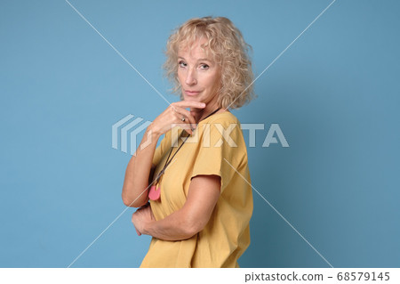 Smiling caucasian senior woman looking at camera. 68579145